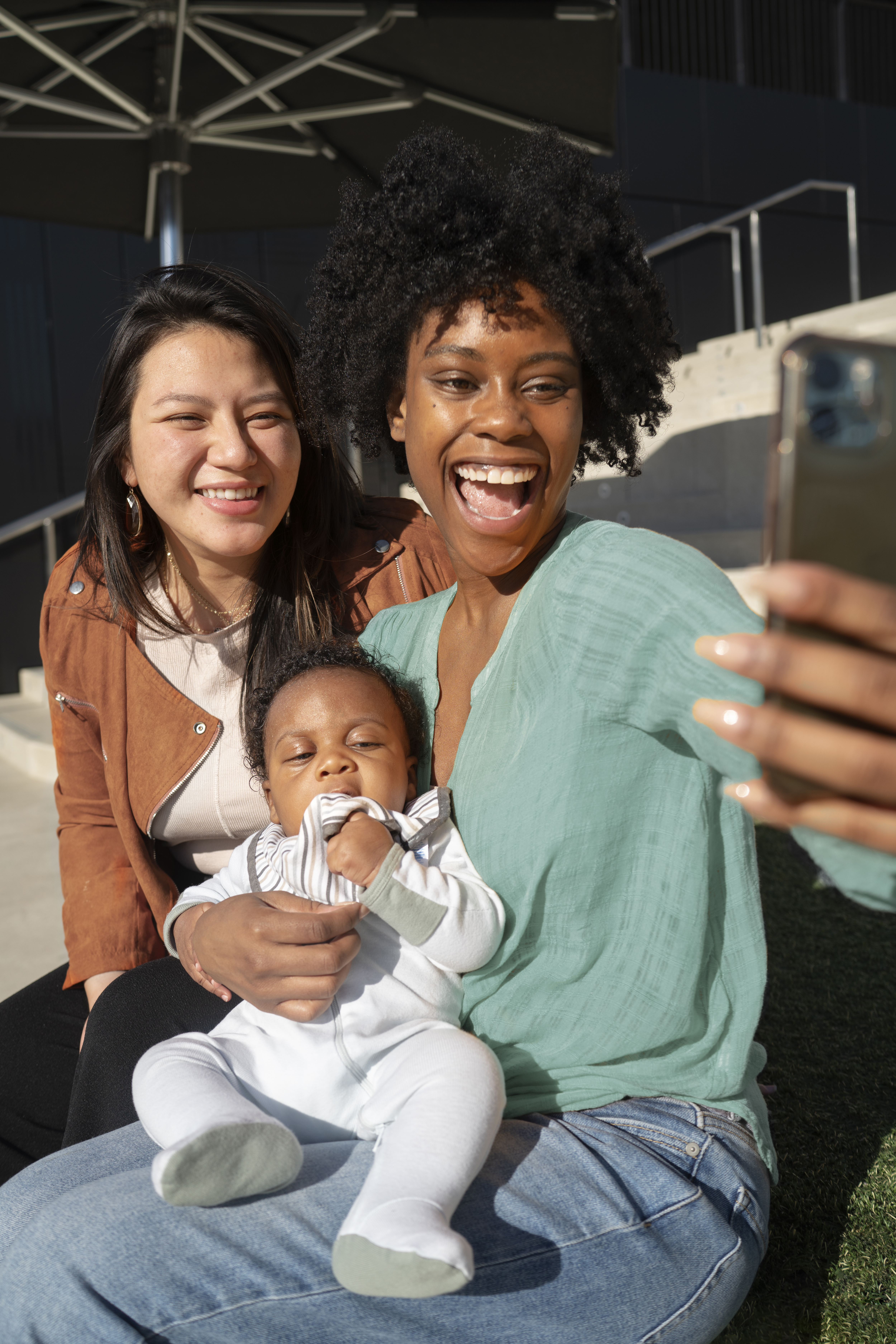 smiley-women-taking-selfie-outdoors-medium-shot